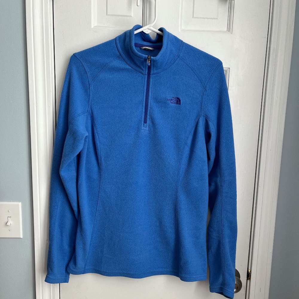 Beautiful blue North Face 1/4 zip fleece top. Size M/L